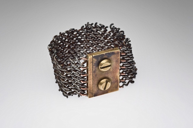Steel, mesh, bracelet, rugged, industrial, trash, debris