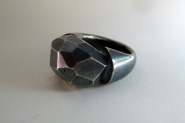 Silver, faceted cast wealth massive, opulent, bold stone,  