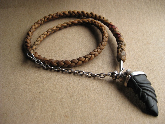 Goat, carved horn, leather, necklace, barbaric, primitive, tribal. 