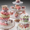 Her Majesty's Feast: Pink crystal Icing puff, Three- tier Diatom Sweet Stack, and Anemone Tarts and Barnacle Crumpets on a triple stand