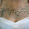 grey shaded swirls ,,added later to define music banner