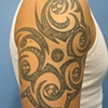 tribal arm with line-work fill