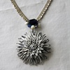 Carved flower burst necklace N 181