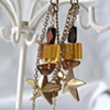 Ocher & brass star earrings E 144