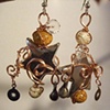 Wirey silver stars with orange nut beads - E 18
