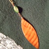 Orange shell with green pendant - P 08