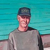 Man at Dain's Lumber Yard