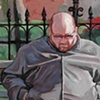 Man Sleeping on Bench