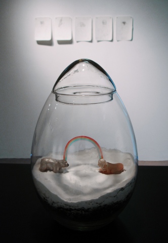 Connection (a woman and a juvenile polar bear thinking a rainbow)