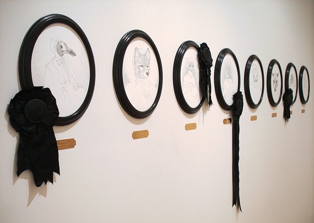 Ten 'Extinction Portraits' lined the back wall, each with a museum-style brass plaque underneath, stating the species name and extinction date for each piece