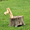Two stumps and an axe lounge chair