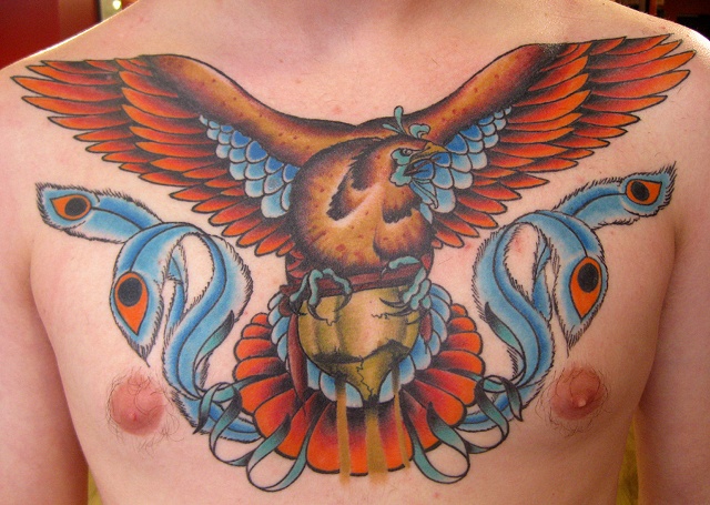 Phoenix chest piece tattoo by
