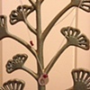 silver leaf cutout & ruby necklace
