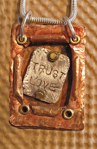 Soldered and cold connected silver, copper and brass necklace
