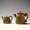 Four Rusty Luster Teapots