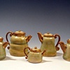 Five Rusty Luster Teapots