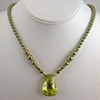 Peridot Cubic Zirconia and Swarovski Pearls.