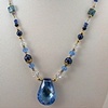 London Blue Topaz CZ with Sapphires, Kyanite, and Swarovski crystal.