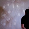 At the vernissage my husband admiring one of Ewas works.
