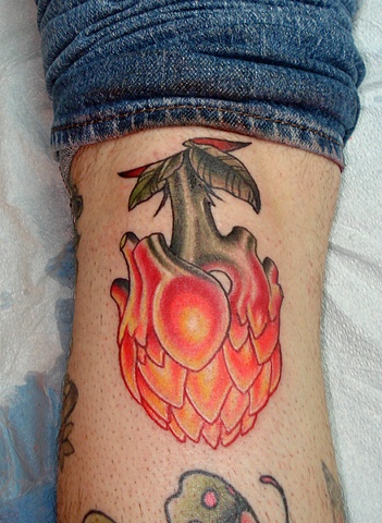 Glowing Artichoke-Heart Morph Tattoo