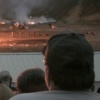 Watching (burning rubble)
