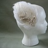 winterwonderland feathers and applique hair fastener.