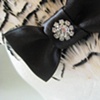 feathers and ribbons and bows hair fastener.