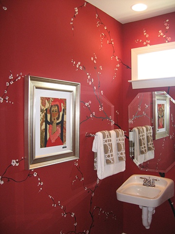 bathroom with cherry branches and blossoms paint by the design deli