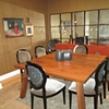 Gold gauze overlay on dining room walls.