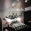 Killer teen room painted with high gloss walls, gold and silver ceiling, and graffiti themed mural. Room designed by Julie Abner.