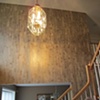 Metallic plaster troweled over custom metallic paint- two level foyer.