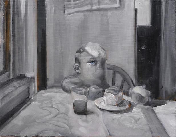 little boy with no mouth at the table eating bread apple