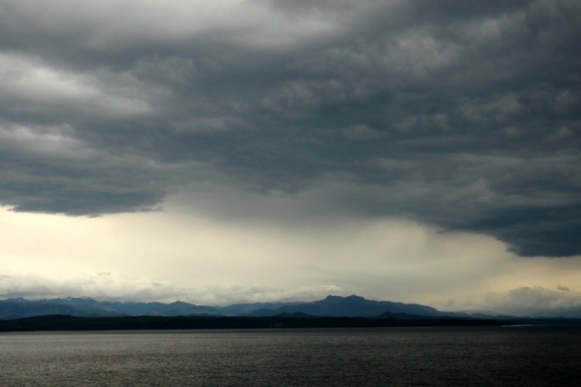 Ocean, mountains, clouds off coastal Alaska