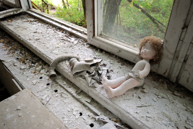 Doll and gas mask