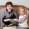 Brother, sister and cat