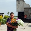 Olga offers flowers