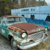 Old Studebaker At Garage