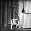 Single Chair On A Loading Dock