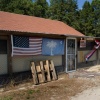 Flags On The Side Of An Empty Building