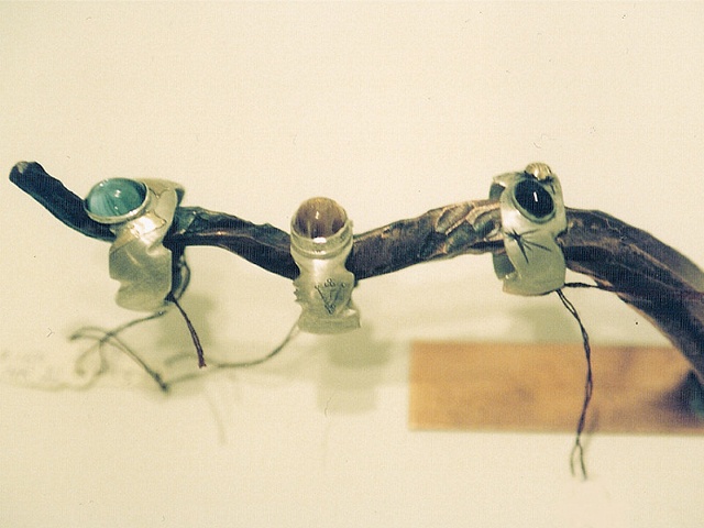 Three rings and copper stand