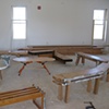 student benches created from wooden beams from neighboring building - furniture for 601 Tully