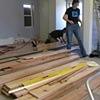 Laying floor boards
601 Tully logo on tshirt