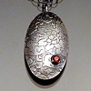 Etched Oval Necklace with Garnet, oxidized