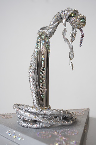 detail of silver lingam