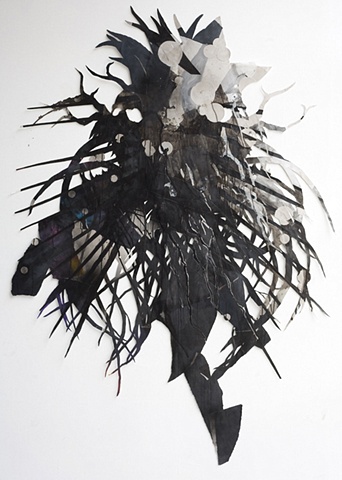 Tentacled skull collage by artist Owen Rundquist