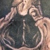 Skull tattoo on back of head