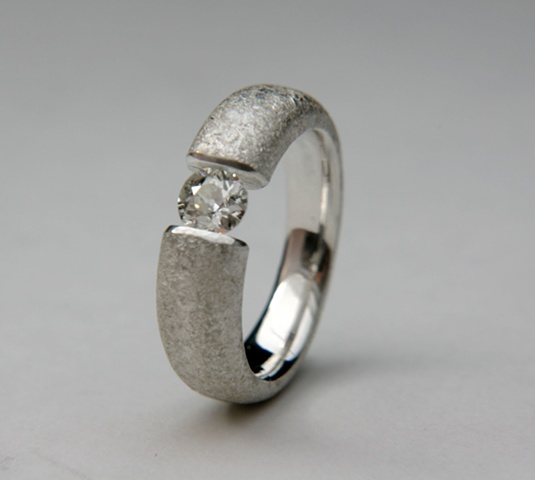 silver,diamond,tension set