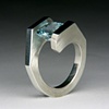 Margo is a Sterling Silver bi-pass tension set ring