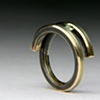 Bi-Pass 14kt yellow gold tension set Demantoid Garnet