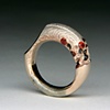 Cuttle fish casting floating Orange Sapphires 